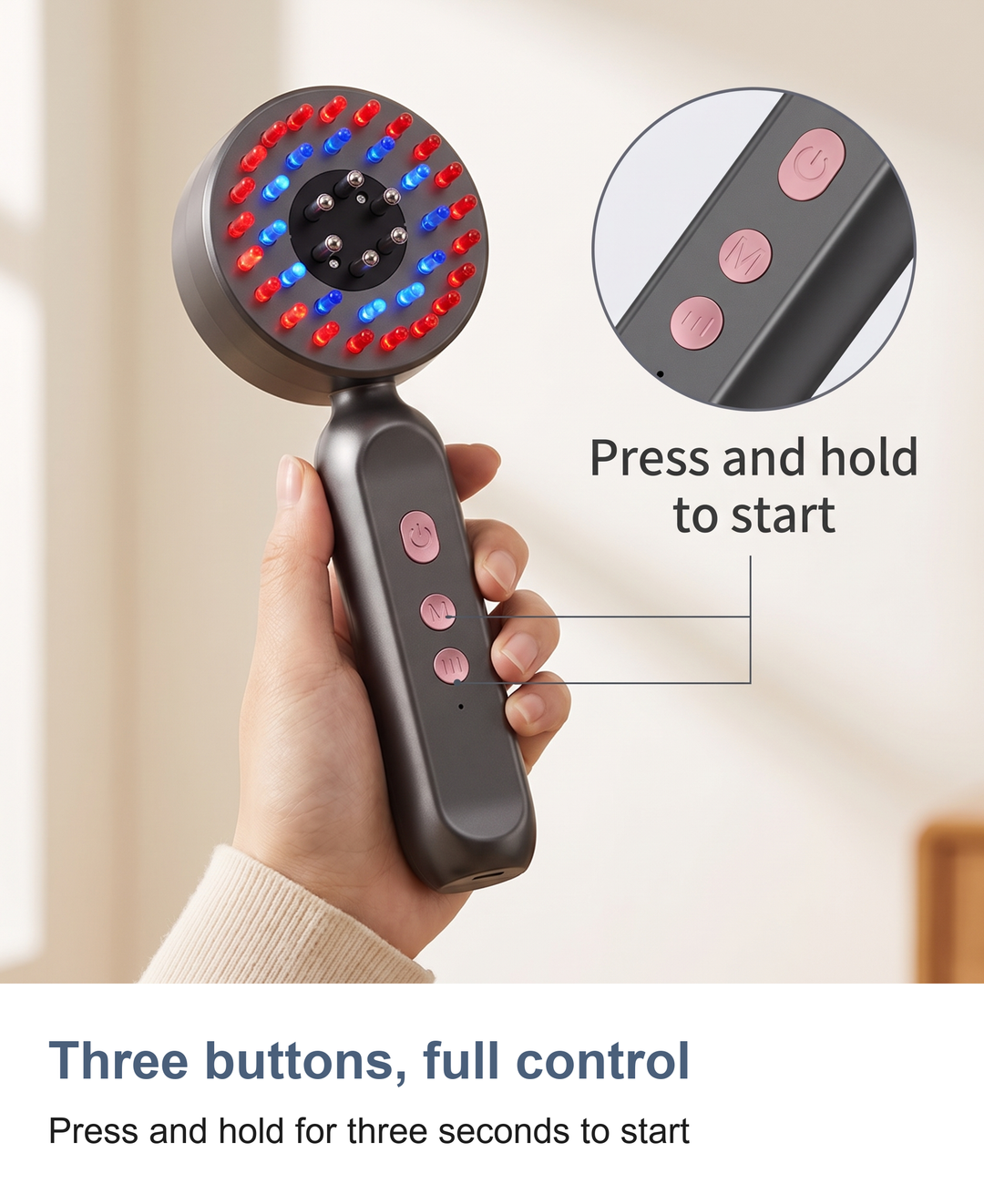 Close-up of the three control buttons on the scalp massager handle