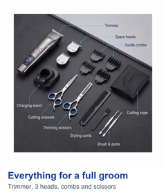 Full trimmer kit laid out: trimmer, heads, stand, guide combs, scissors, comb, cape