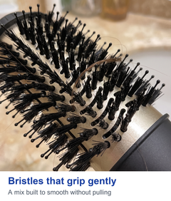 Macro of the oval bristle barrel with a strand of hair