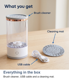 Everything in the box: brush cleaner, USB cable and cleaning mat