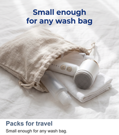 Facial cleansing brush packed in a wash bag for travel