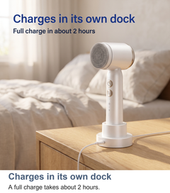 Facial cleansing brush charging upright in its round charging dock