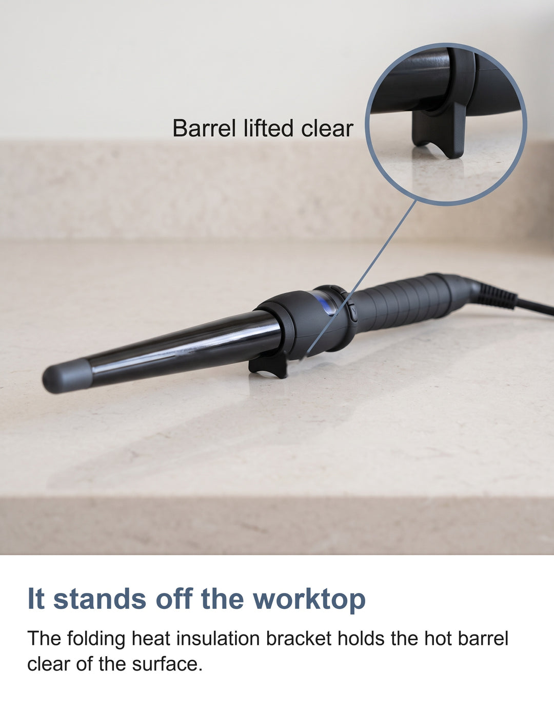 The curling wand resting on its folding heat insulation bracket with the hot barrel lifted clear of the worktop