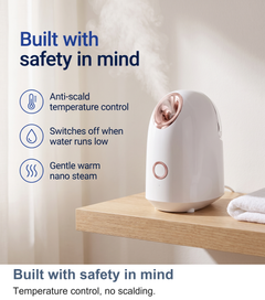Facial steamer on a bathroom shelf showing its safety features: anti-scald control and automatic shut off