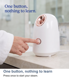 Macro of the single button on the facial steamer