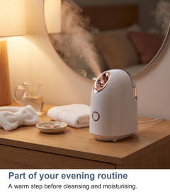 Facial steamer on a dressing table as part of an evening skincare routine