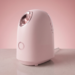 Pink nano facial steamer with a 150ml water tank