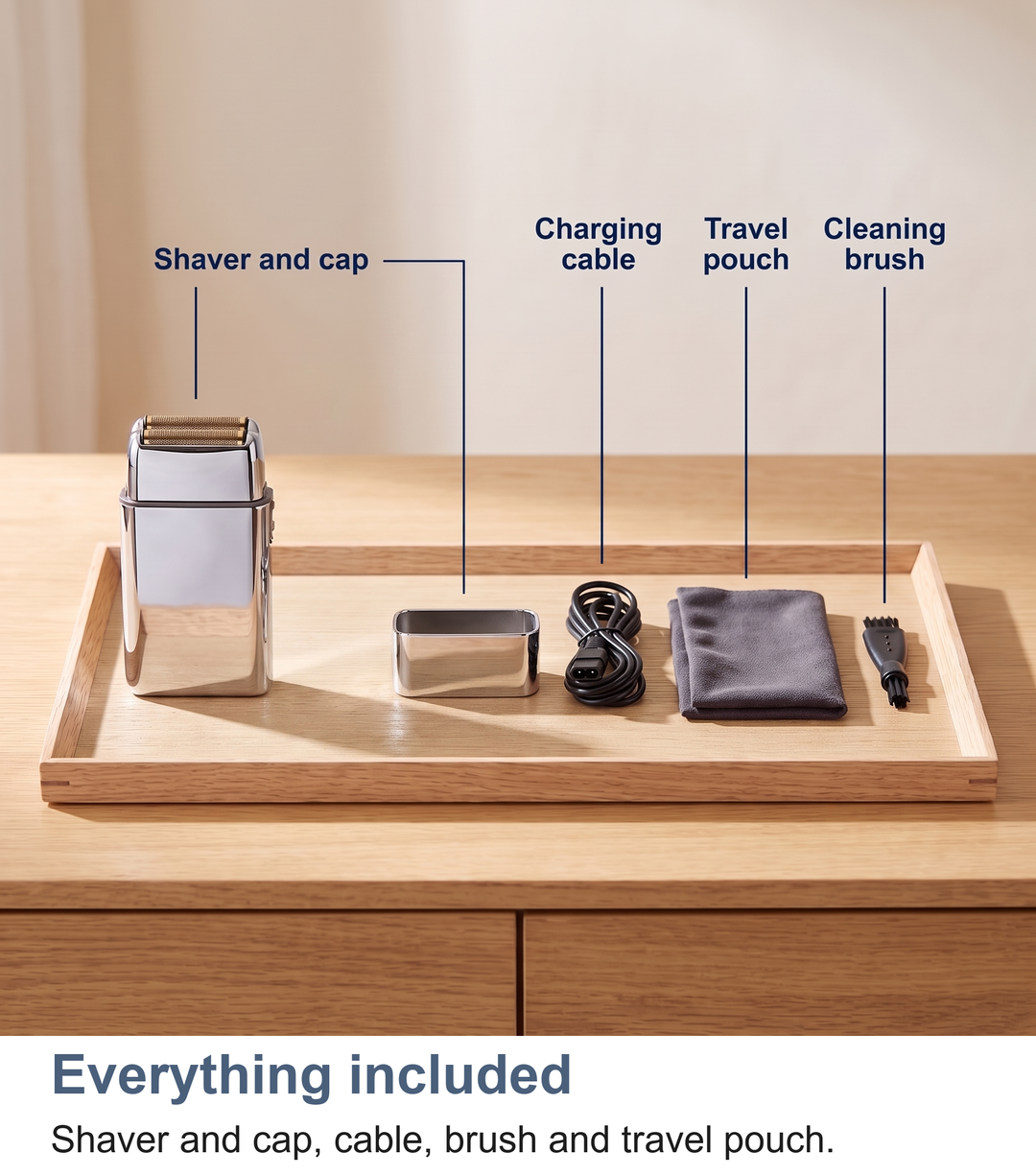 Everything included with the foil shaver: shaver and cap, charging cable, travel pouch, cleaning brush