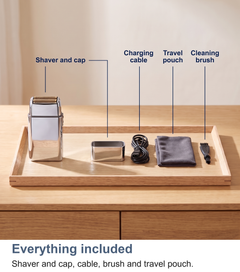 Everything included with the foil shaver: shaver and cap, charging cable, travel pouch, cleaning brush