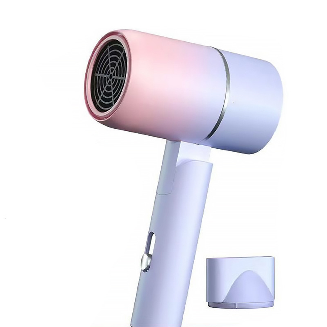 Foldable travel hair dryer in gradient with its concentrator nozzle