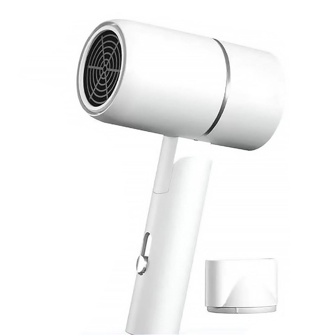 Foldable travel hair dryer in white with its concentrator nozzle