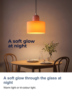 Coloured glass Bauhaus pendant light: A soft glow through the glass at night