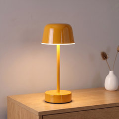 Yellow cordless rechargeable mushroom table lamp, lit