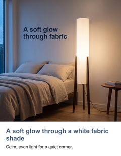 Tall cylinder floor lamp: A soft glow through a white fabric shade