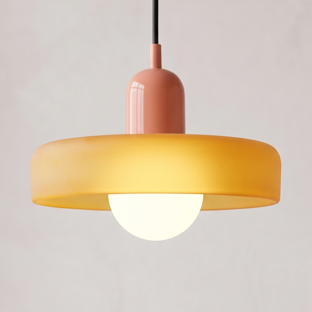 Yellow glass Bauhaus pendant light with pink cap and ring shade