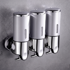 Silver wall mounted soap dispenser with chrome finish
