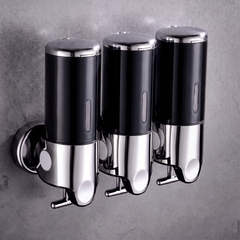 Black wall mounted soap dispenser with chrome finish
