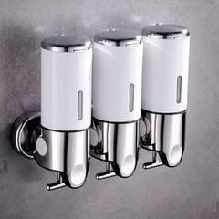 White wall mounted soap dispenser with chrome finish