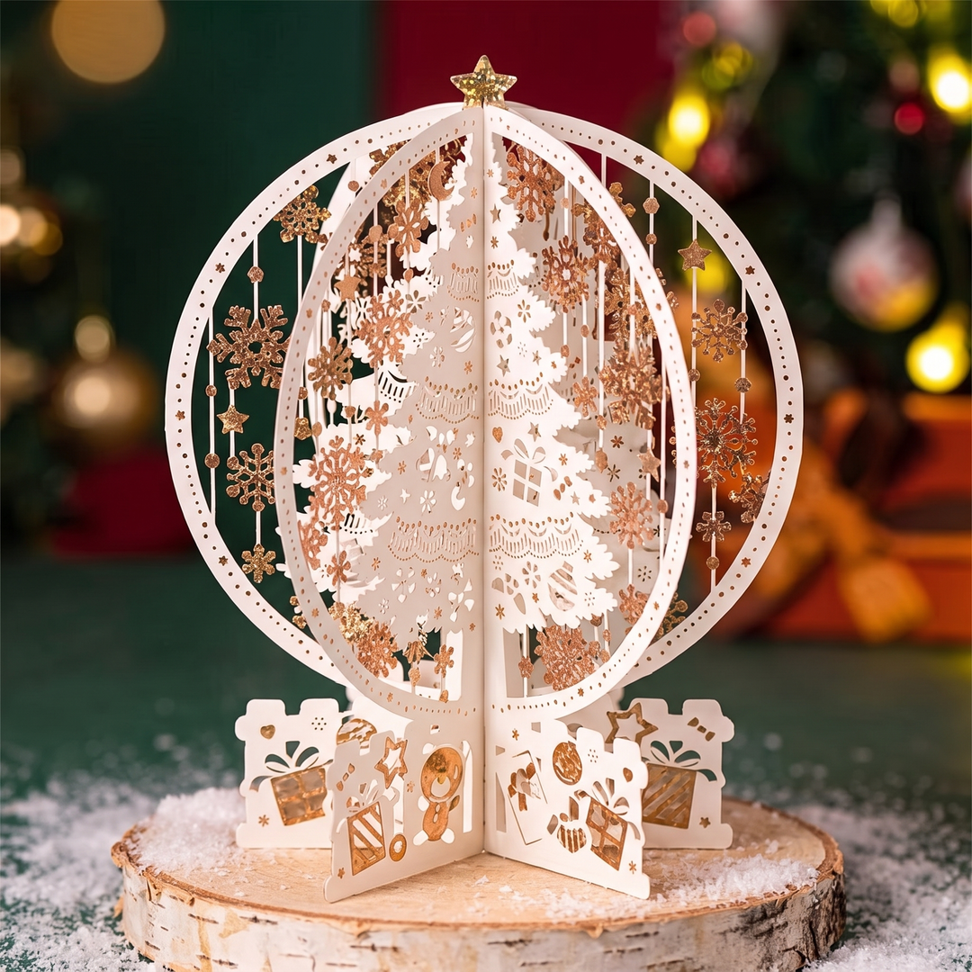 3D pop up Christmas card with a laser cut paper tree on a festive table