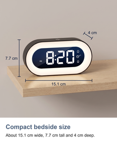 Digital alarm clock with night light: Compact bedside size