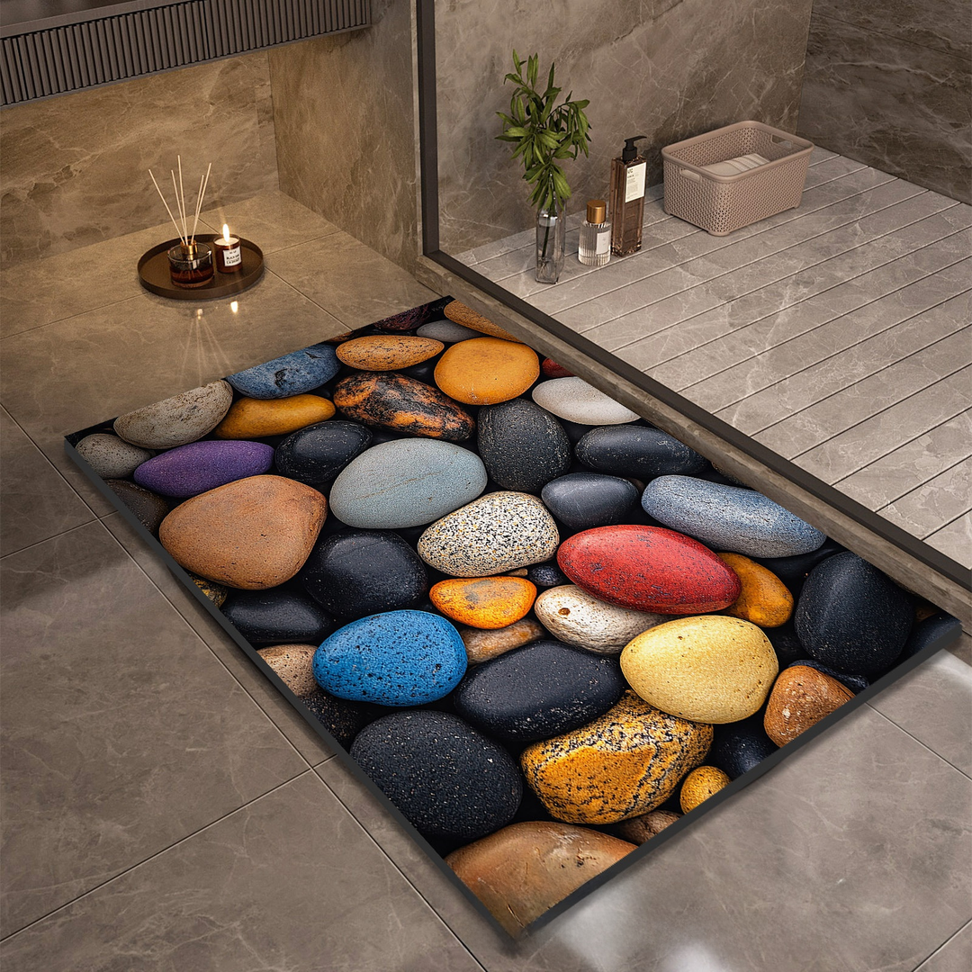 Diatomite bath mat, Bright Pebbles print, on a bathroom floor outside a walk-in shower