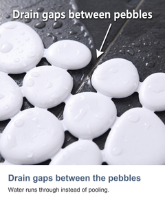 Pebble shower mat with suction cups: Drain gaps between the pebbles