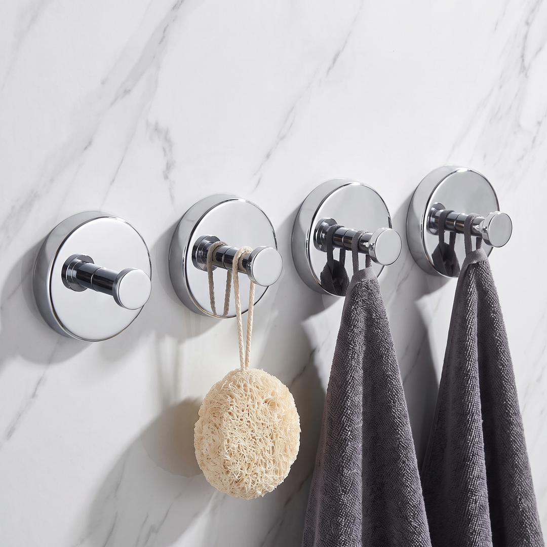 Chrome round suction hooks, pack of four, holding towels and a loofah on a marble wall