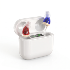 Pair of in-ear hearing amplifiers in a white charging case on cream travertine
