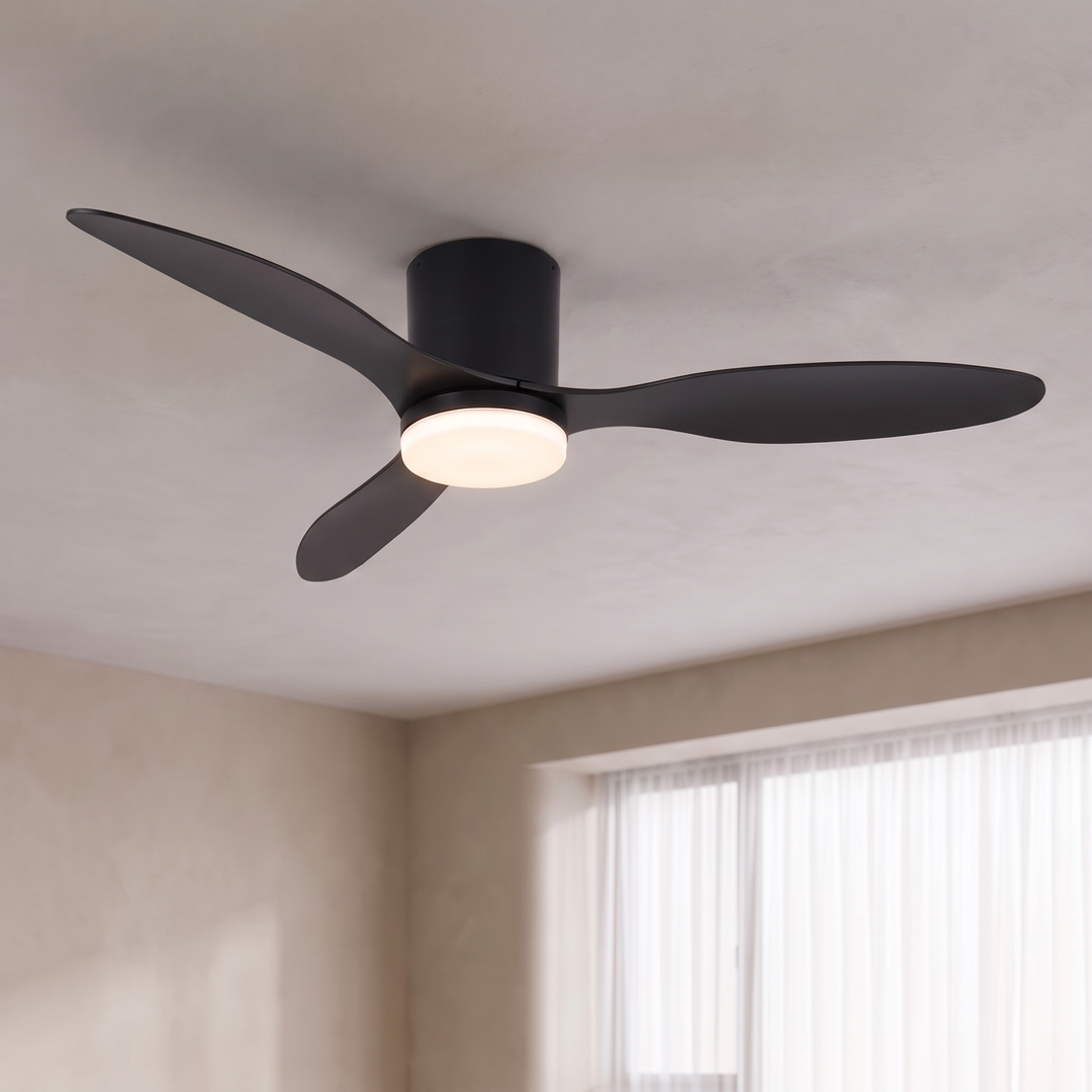 Black 52 inch low profile ceiling fan with LED light on a ceiling