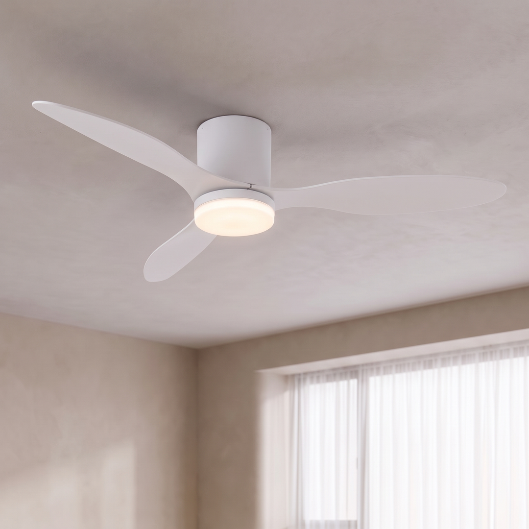 White 52 inch low profile ceiling fan with LED light on a ceiling