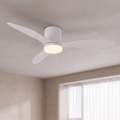 White 52 inch low profile ceiling fan with LED light on a ceiling