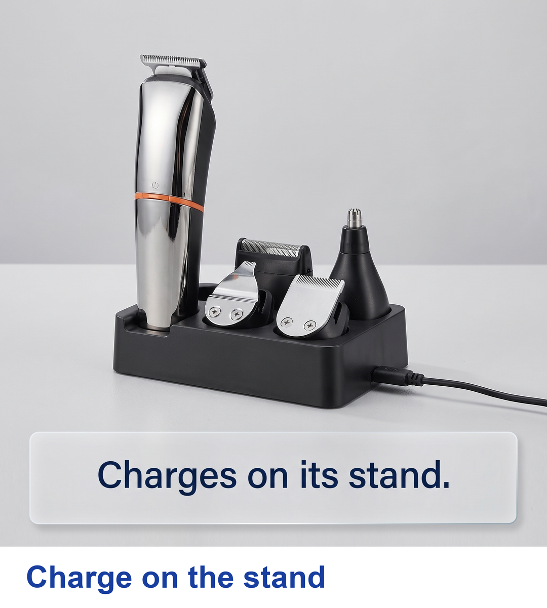 Trimmer and heads seated on the charging stand with a cable