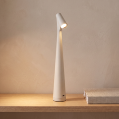 White cordless rechargeable table lamp on a console table