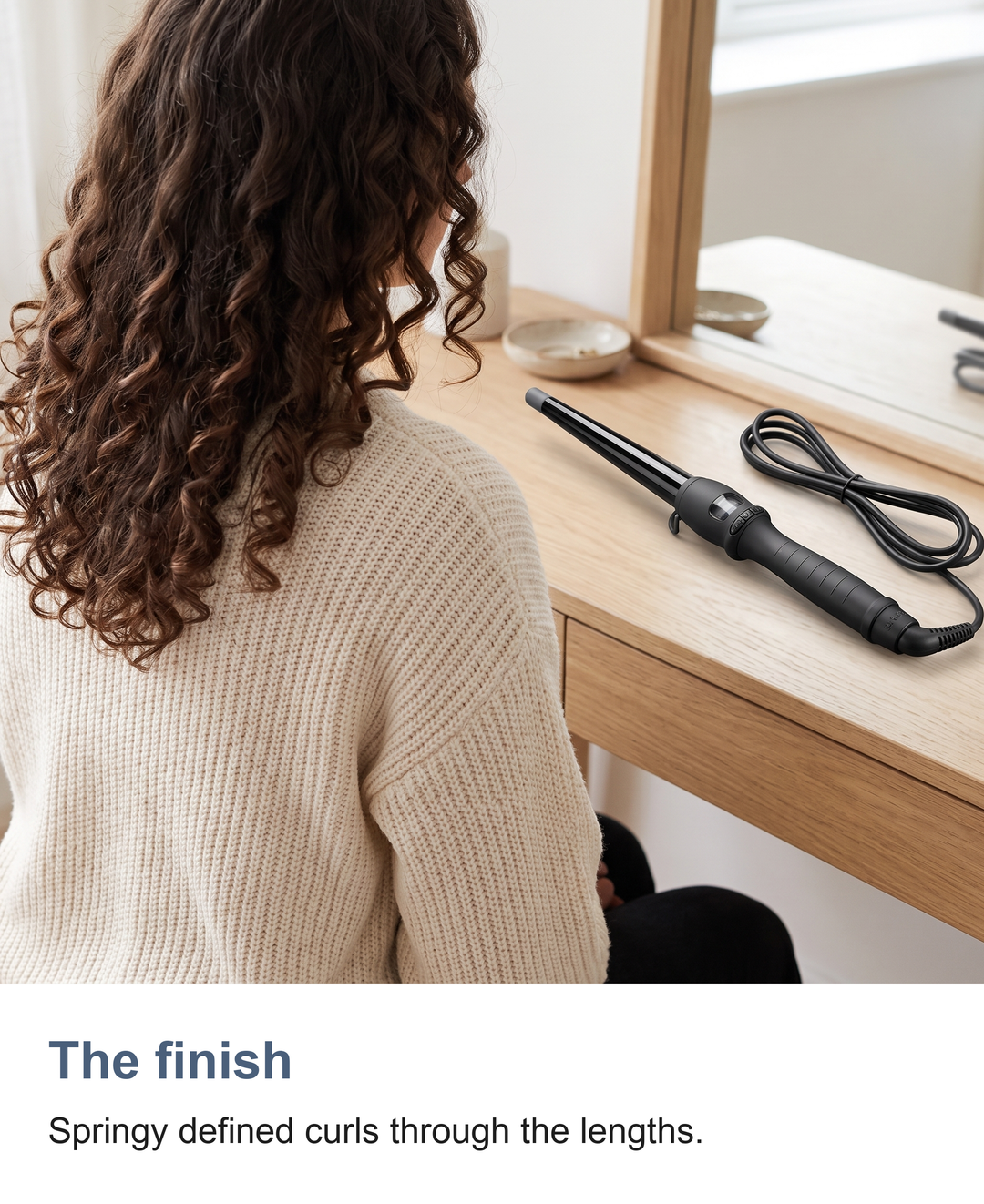 Springy defined curls through the lengths, made with the conical curling wand