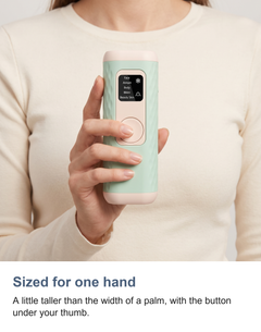 The IPL hair removal device held in one hand to show its size