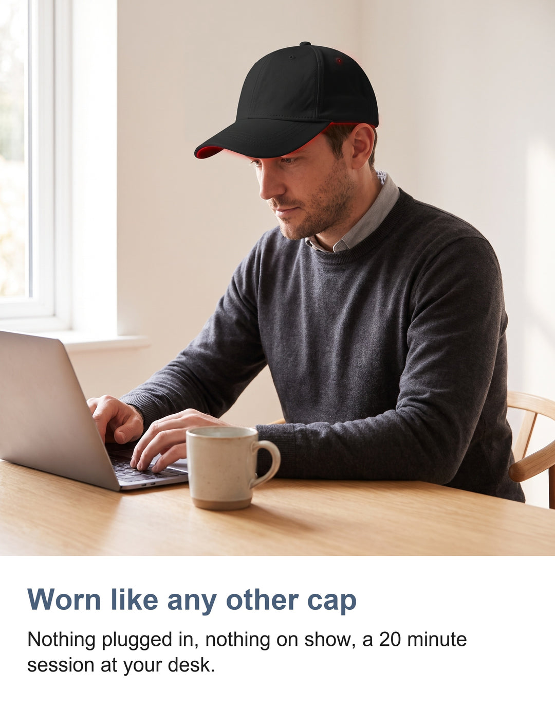 The red light cap worn at a desk like an ordinary black baseball cap