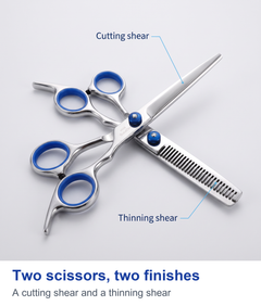 Two barber scissors crossed, a cutting shear and a thinning shear