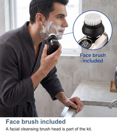 Man using the face brush attachment on the rotary shaver to wash his cheek