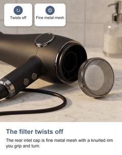 The removable mesh inlet cap twisted off the rear of the hair dryer barrel