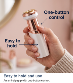 Hand holding the lady trimmer showing its anti-slip grip and one-button control