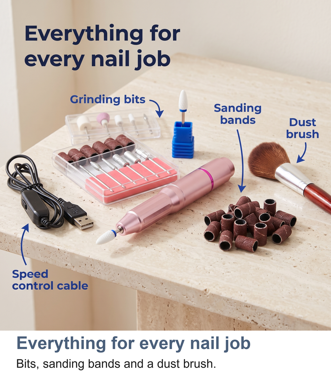 The full nail drill kit fanned out: bits, sanding bands and a dust brush