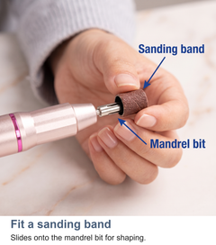 Macro of a sanding band fitting onto a mandrel bit on the nail drill
