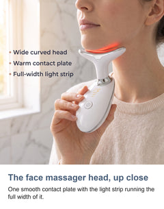 Close view of the massager head showing the smooth contact plate and the light strip running the full width of its front edge