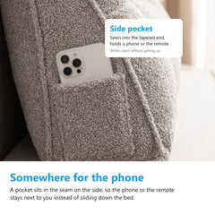 Close up of the side pocket on a headboard bolster cushion with a phone tucked inside