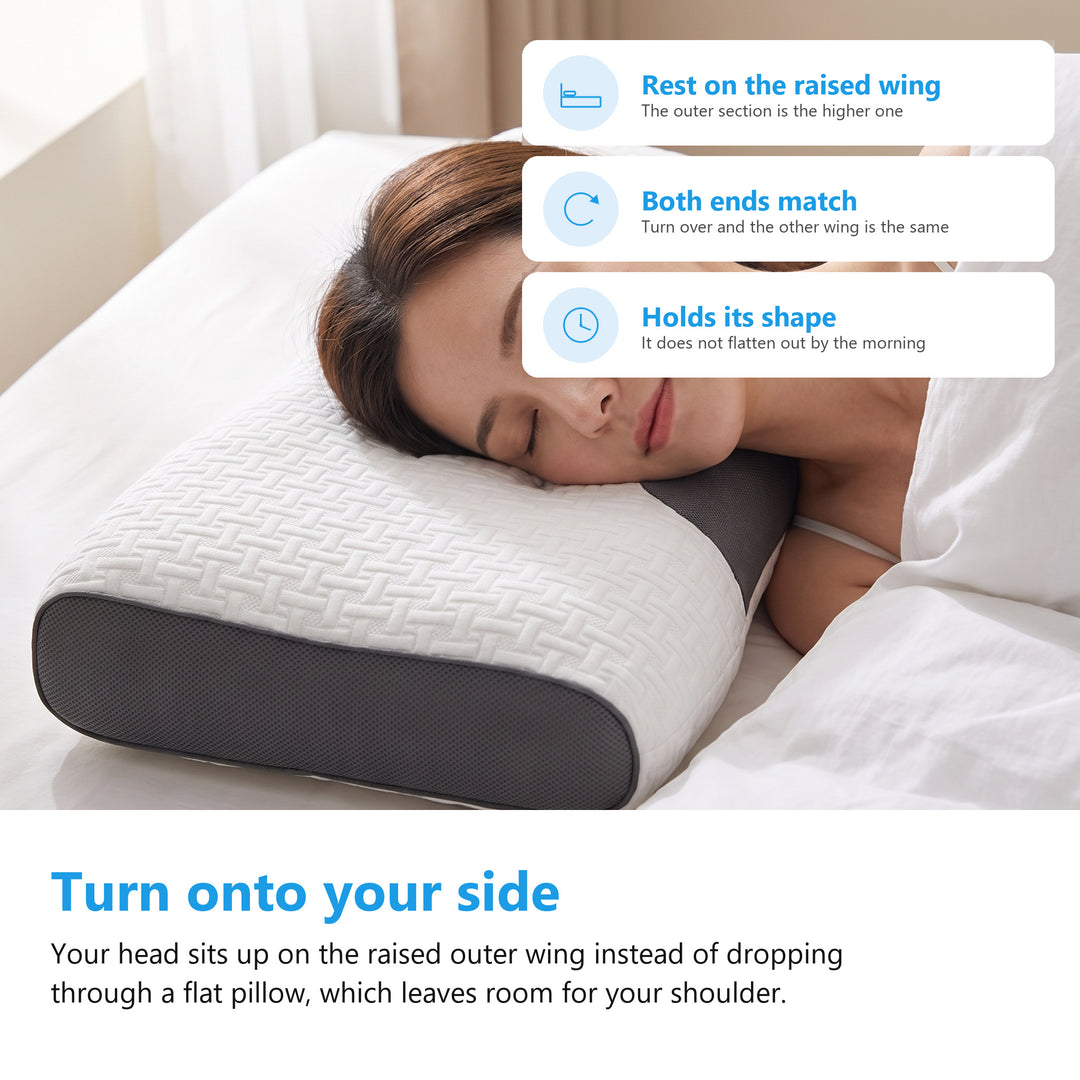 Woman asleep on her side with her head resting on the raised outer wing of the contoured pillow