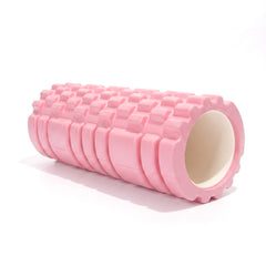 Pink textured foam roller with a raised grid surface on a white background