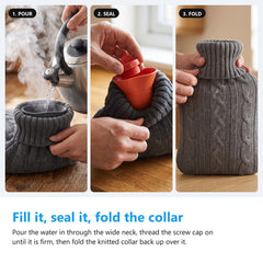 Filling a hot water bottle, pouring from a kettle, threading the screw cap on and folding the knitted collar back up
