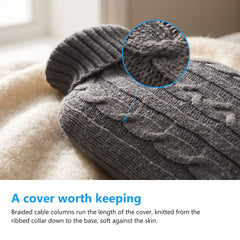 Close up of the braided cable knit pattern on a hot water bottle cover