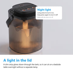 Humidifier night light glowing through the smoked tank