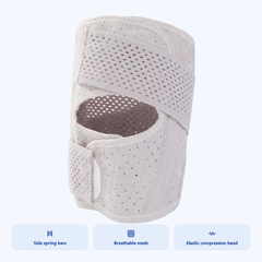 Knee pad panel showing side spring bars and breathable mesh